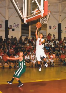 Brian Andres of Kaua‘i goes up for an easy bucket