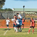 Waimeaâ€™s defense converges to stop a KHS corner kick