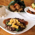 Chefâ€™s Trio (clockwise from top) -- Seafood Lau Lau, Ono in tomato broth and Peppercorn Skirt Steak with Pineapple Relish -- is served with brown rice with furikake