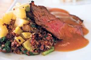 Peppercorn-rubbed skirt steak with grilled vegetable quinoa and pineapple relish