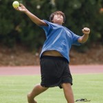 Kelly Ragasa of Waimea Canyon School launches a softball