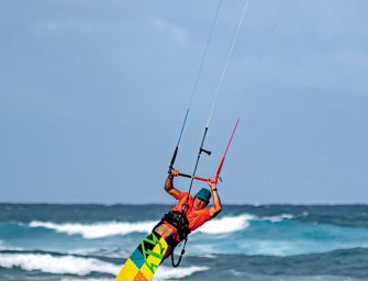 Kite Surfers Ride On In Stormy Weather